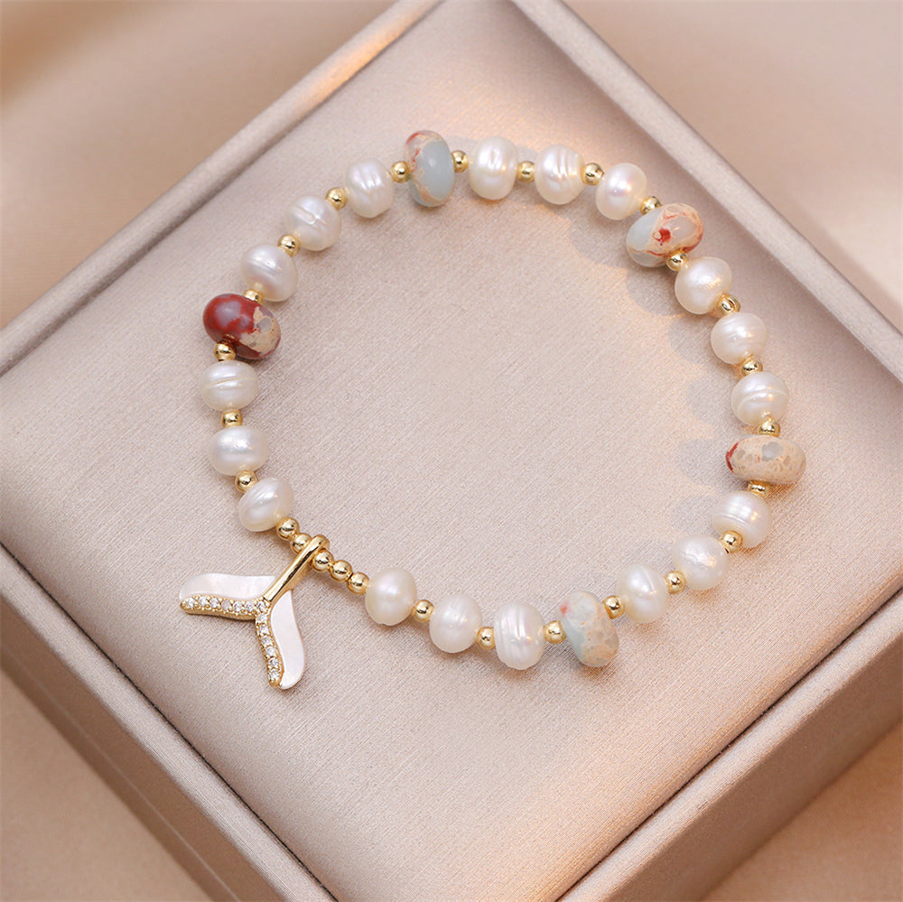 Sophisticated Pearl Bracelet with Fish Tail Accent 2913