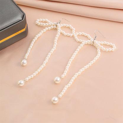 Timeless Bow-Embellished Pearl Earrings 2887