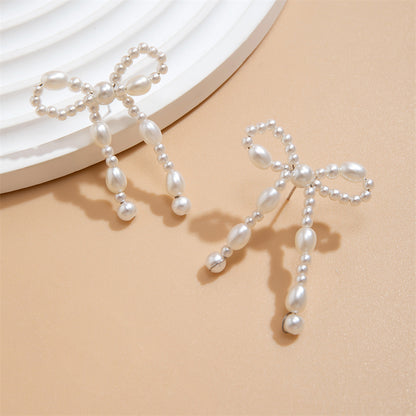 Timeless Bow-Embellished Pearl Earrings 2887